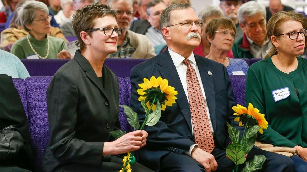 Kansas Supreme Court Justice Carol Beier, left, sits with Chief Justice Lawton Nuss, center, during an appearance in Wichita earlier this year.