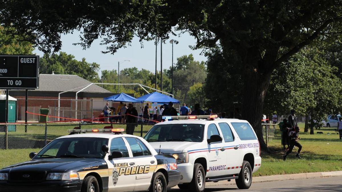 
Police investigate after a 7-year-old boy was hit by a semi while retrieving a football near Hydraulic and Funston. (Sept. 26, 2015) 
