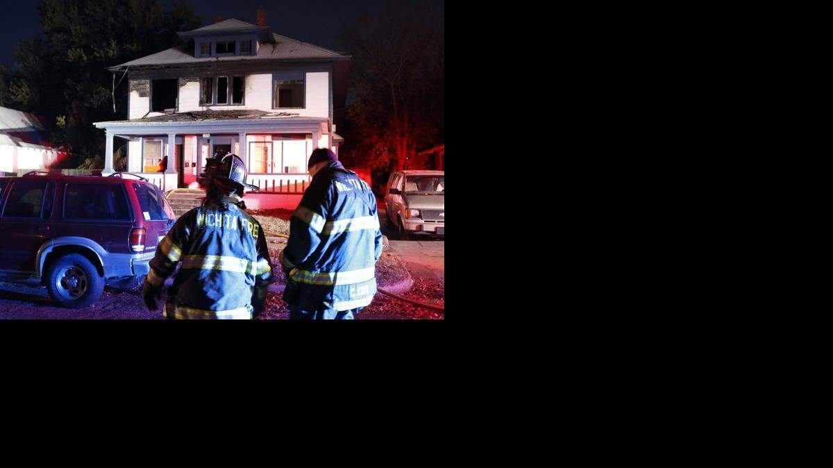 
Wichita firefighters at an early morning fire at 1343 S. Water where a 9-year-old boy died. (Nov. 12, 2014)
