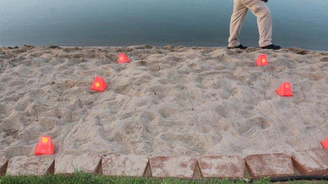 Part of the scene at the lake where police investigated the drowning of 11-year-old Shelby Cramb. She was attending a church-related party with 105 to 110 children.