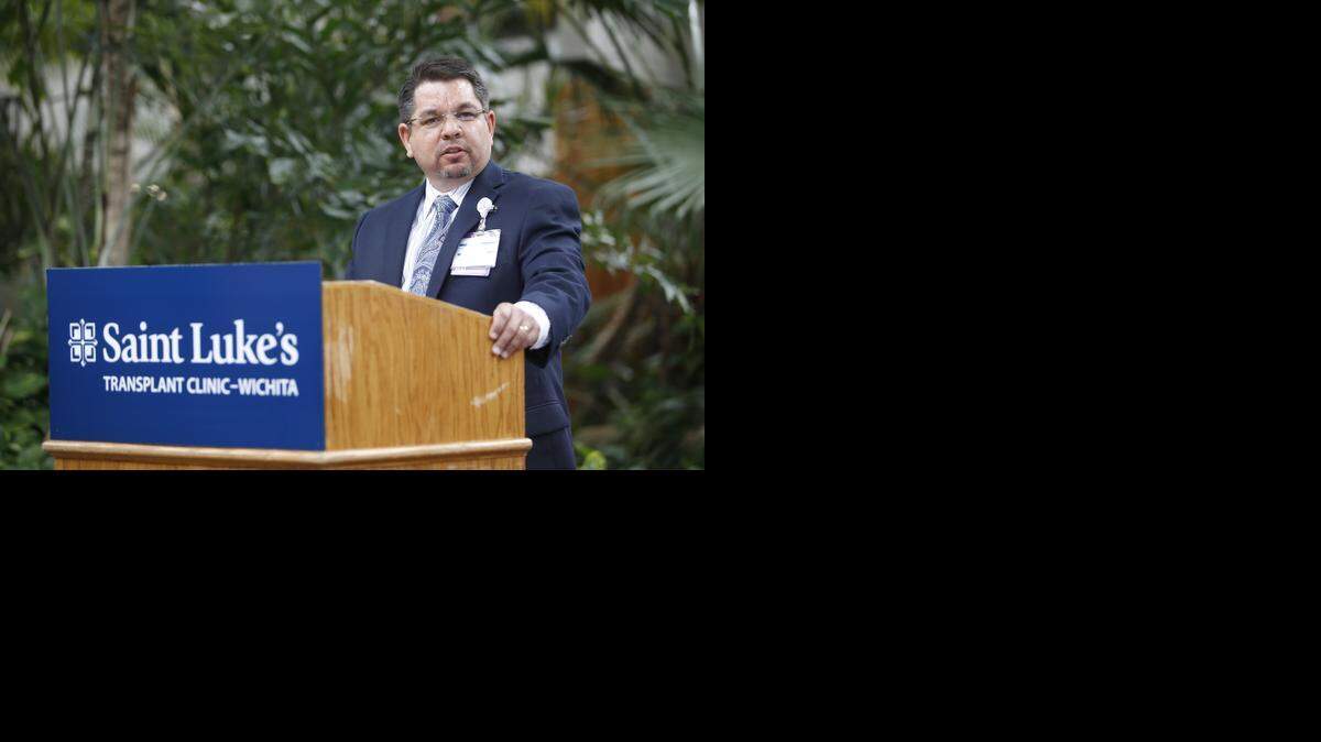 
Gary Sigle, abdominal transplant administrator in Wichita for Saint Luke’s Hospital of Kansas City Kidney Transplant Clinic, speaks Wednesday during the grand opening of the Wichita location. (August 27, 2014)
