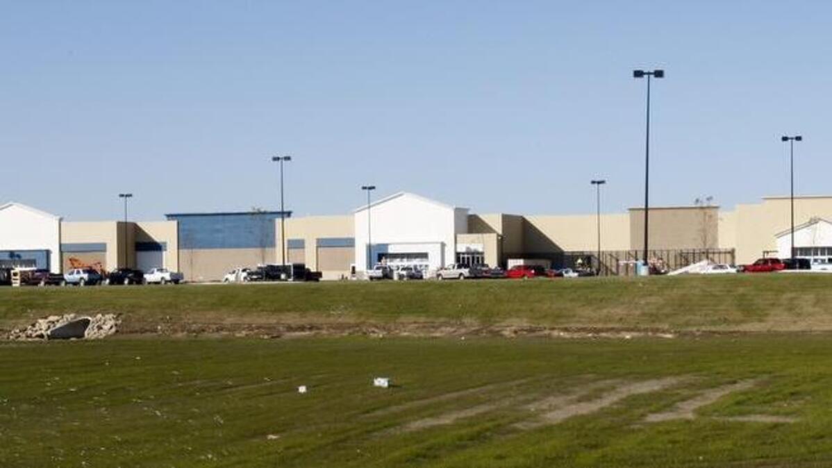 This file photo shows the Wal-Mart at Meridian and 53rd Street when it was under construction. A woman was found dead in her car in the parking lot late Friday morning.