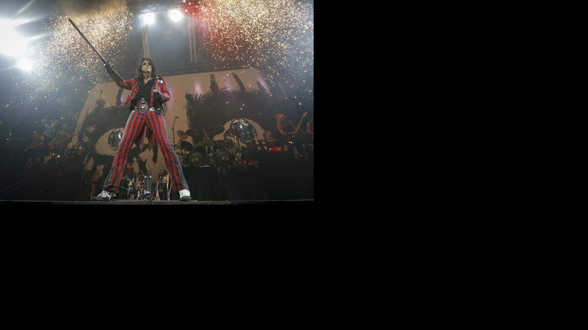 
1970s rock icon Alice Cooper opens the show for Motley Crue at Intrust Bank Arena on Saturday night. (July 12, 2014)
