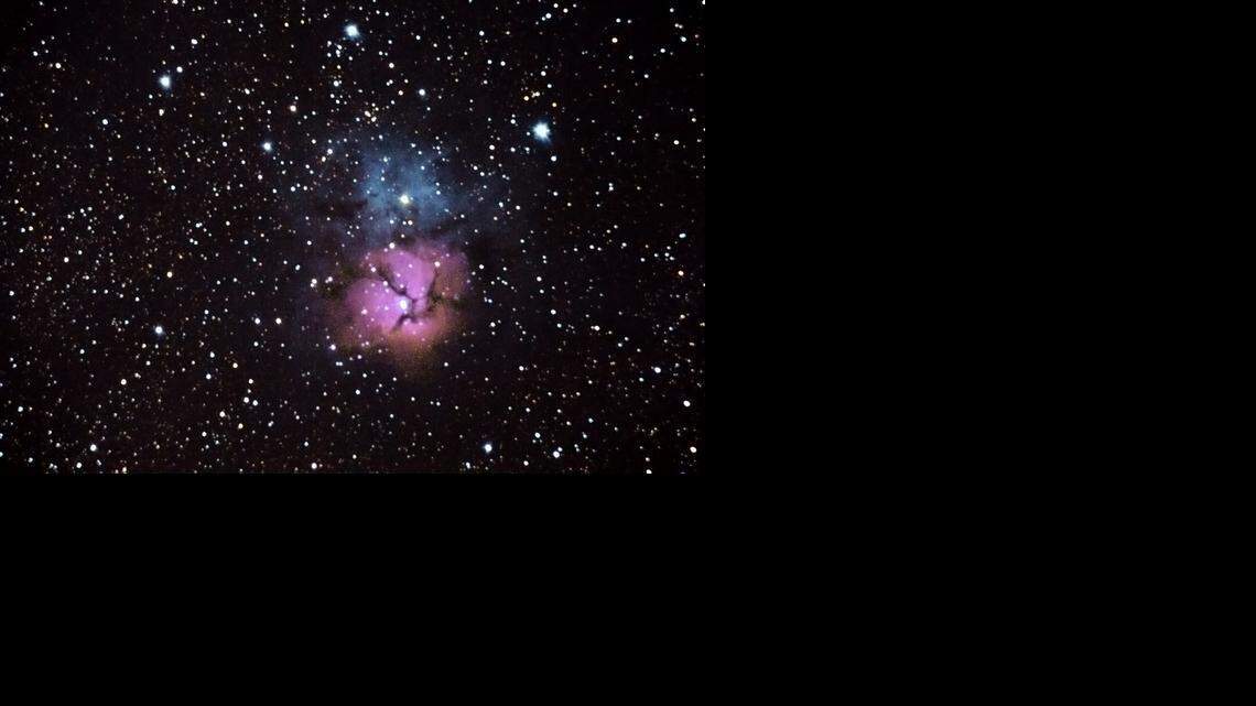 
The M20 Triffid Nebula, photographed Oct. 8, 2013, outside the Lake Afton Public Observatory with a Canon 300D mounted on an Orion 8-inch Newtonian telescope. 
