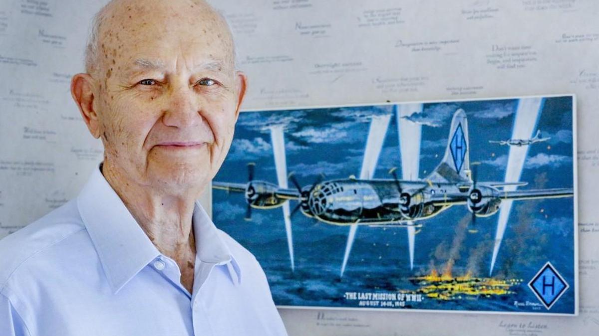 Retired Wichita attorney Marvin Martin, 90, stands next to a drawing of a B-29 that sits in his office in east Wichita. During World War II, he was a navigator on a B-29 and is one of a handful of B-29 crew members still living in Wichita. (Aug. 1, 2016)