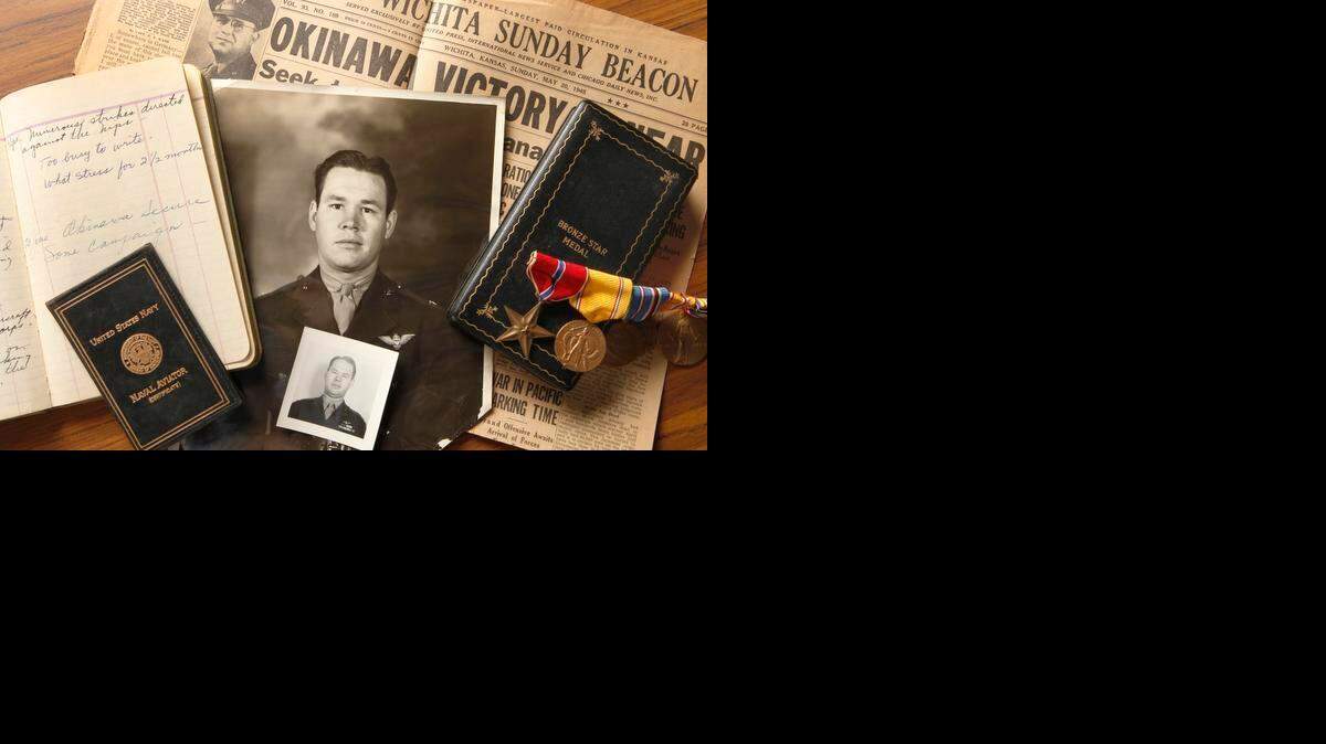 
Wartime mementos of Lt. Col. William A. Kuretich have been kept through the years by his daughter Jean Schodorf and son Bill Kurtis. Kuretich, shown in photos from World War II, was awarded the Bronze Star for his service in the defeat of the Japanese in the Battle of Okinawa in 1945. One of the items is his journal, left, which shows his entry “Okinawa Secure.” (March 25, 2015) 
