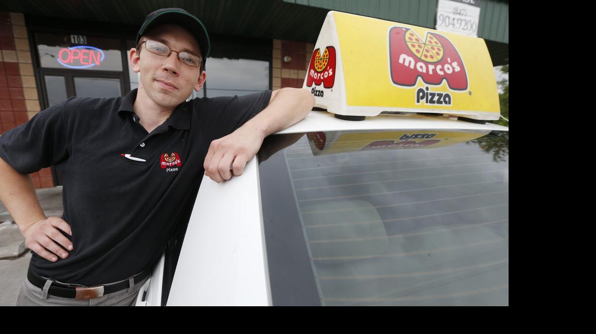 
Casey Lawrence is a delivery driver for Marco’s Pizza. Police say there has been an increase in robberies of food delivery drivers across the city. (July 2, 2015)
