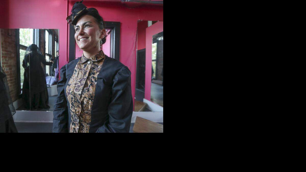 
Christina Ashton portrays a woman from the 1870s as she helps out with Ghost Stories of Historic Delano at Accent Bridal, which used to be a bar and a brothel in the late 1800s. (Oct. 2, 2014) 
