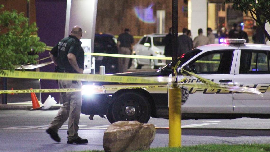 
Police investigate the scene of a police shooting of a man who stopped by a police officer that ended at Kellogg and Dugan on Saturday night. (Aug. 22, 2015)
