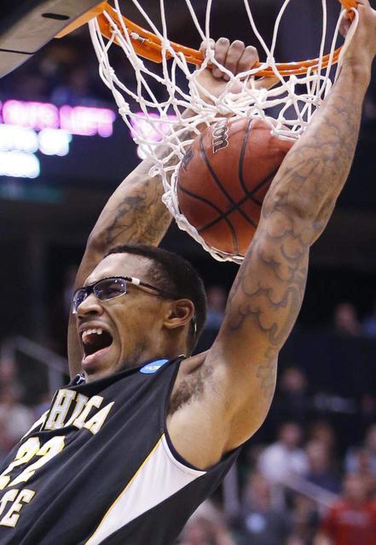 WSU’s Carl Hall dunks the ball against Gonzaga in the first half during the 3rd round of the NCAA Tournament in Salt Lake City Saturday. (March 23, 2013)