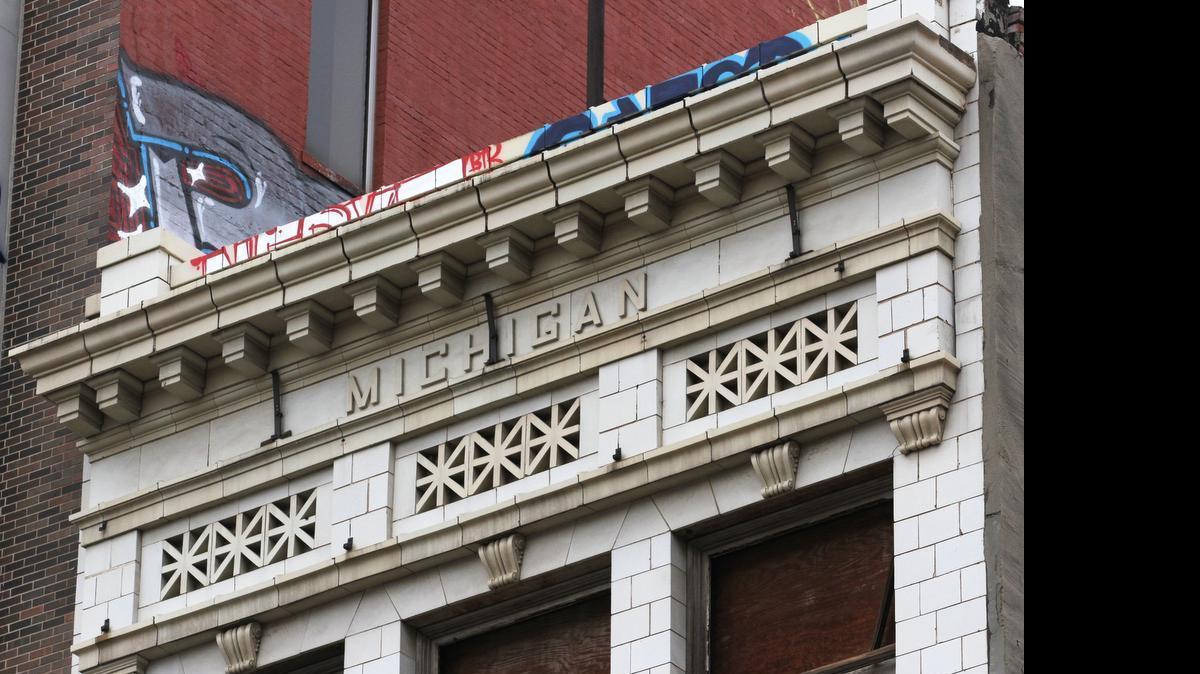 
Most people don’t notice the detailed stonework on the top of the Michigan Building in downtown Wichita. The building, built in 1909, is scheduled to be torn down soon to make room for a downtown project. (June 17, 2015)
