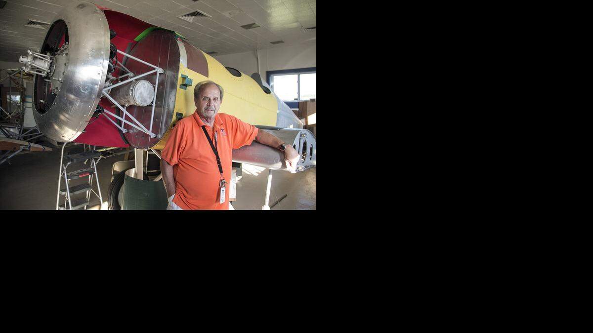 
Volunteer Terry Dobson with a 1930 Watkins Skylark, built in a factory across Douglas from East High. He has been at the Kansas Aviation Museum for the past 11 years and is manager of the restoration department. (Sept. 4, 2014)
