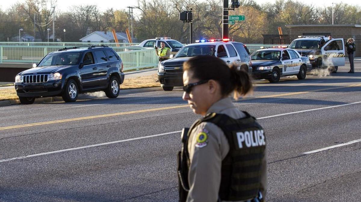 Wichita police investigate the scene where a 15-year-old pedestrian was hit at Lincoln and McLean Boulevard on Monday morning. (Nov. 23, 2015)