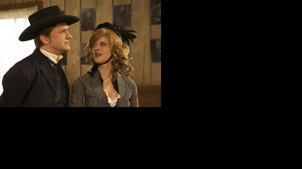 
John Lehr, left, plays Sheriff John Henry Hoyle, a lawman who solves crimes, in “Quick Draw,” a comedy Western set in Great Bend during the mid-1870s. Belle Star is played by Arden Myrin.
