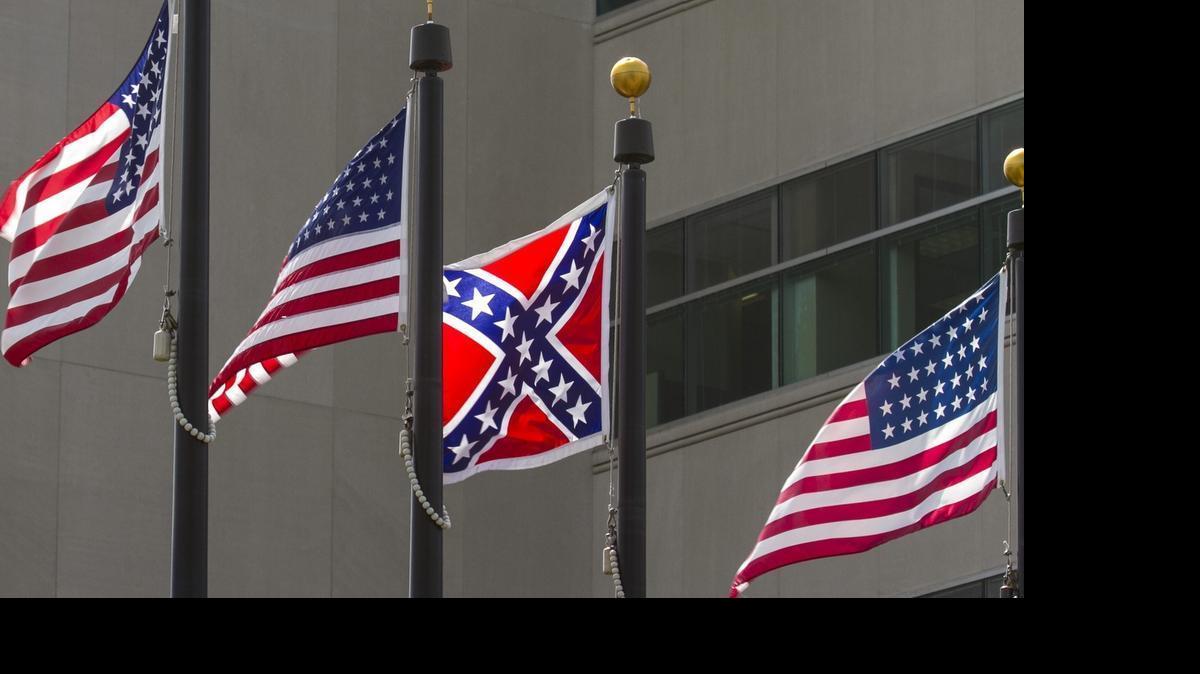 
A Confederate flag flies with other flags that have flown over American soil at the Veterans Memorial Park in Wichita. (June 23, 2015) 
