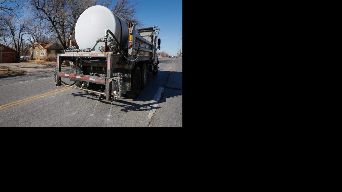 
A city of Wichita truck spreads a brine solution on Oliver before a predicted winter storm in 2013.

