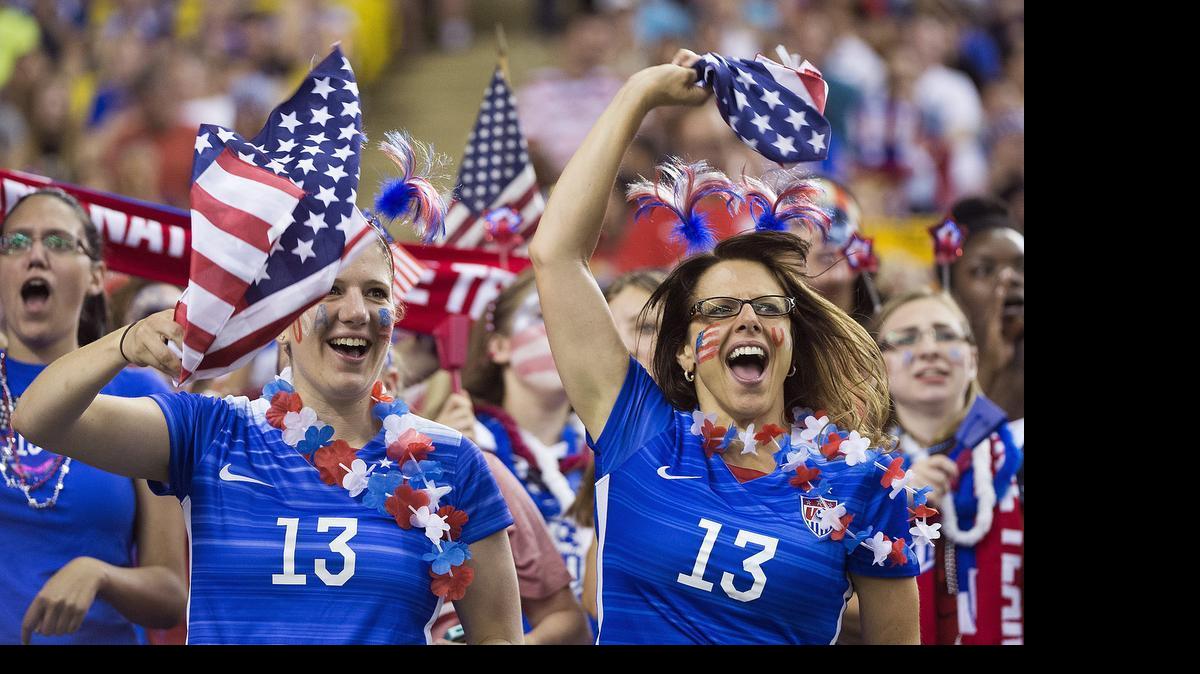 
In this June 30 photo, U.S. fans cheer on the team before its semifinal against Germany in the Women’s World Cup soccer tournament in Montreal, Canada. 
