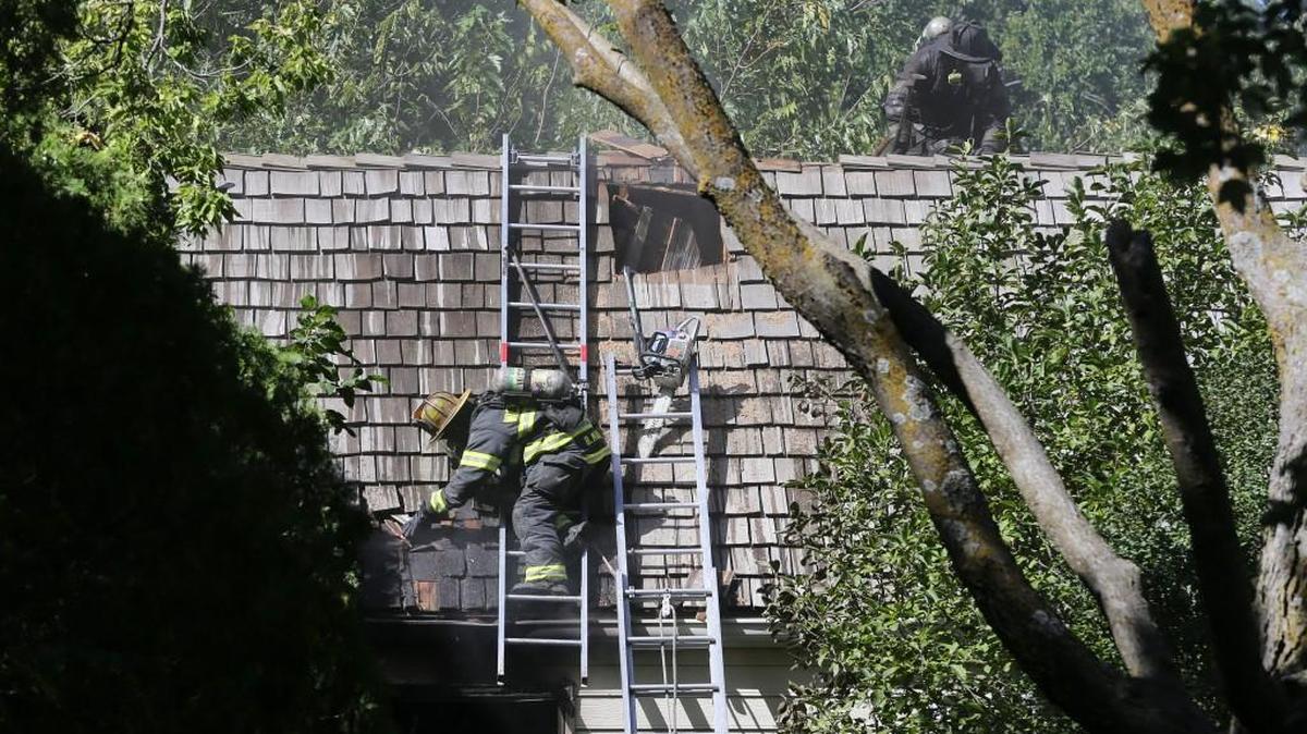 Wichita fire crews handled a fire that damaged a large house in Eastborough on Monday. (Sept. 26, 2016)