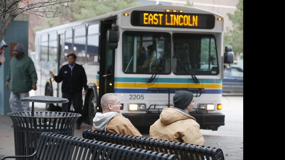
Riders wait for their bus at the Downtown Wichita Transit center late last year. With a $2 million shortfall looming for Wichita’s transit system, City Council members are considering a stopgap approach for next year as they review options for new long-term funding.

