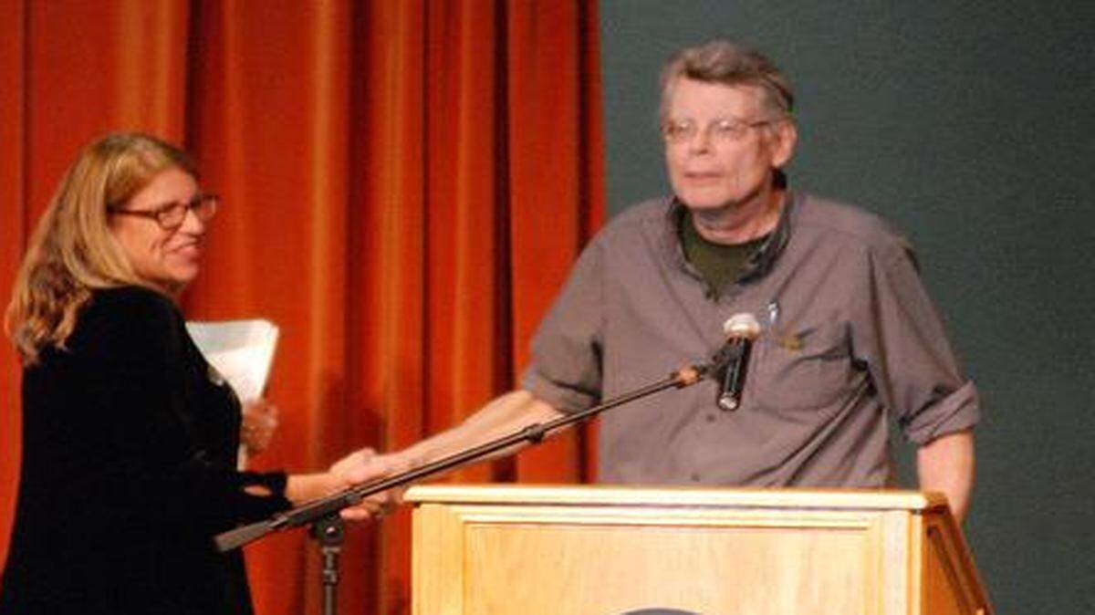 
Sarah Bagby of Watermark Books introduces Stephen King to a large audience at the WSU Hughes Metropolitan Complex on Friday night.
