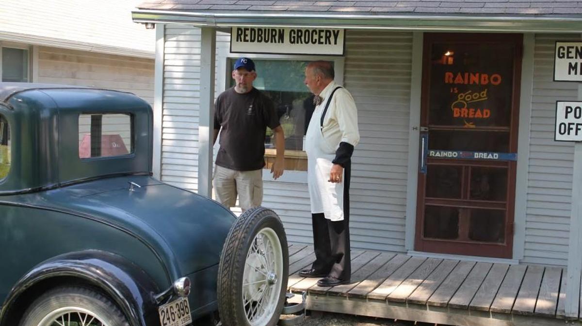 Director Ken Spurgeon, left, talks with actor Mark Hartke while shooting the movie “Home on the Range” at the Kansas Oil Museum in El Dorado.