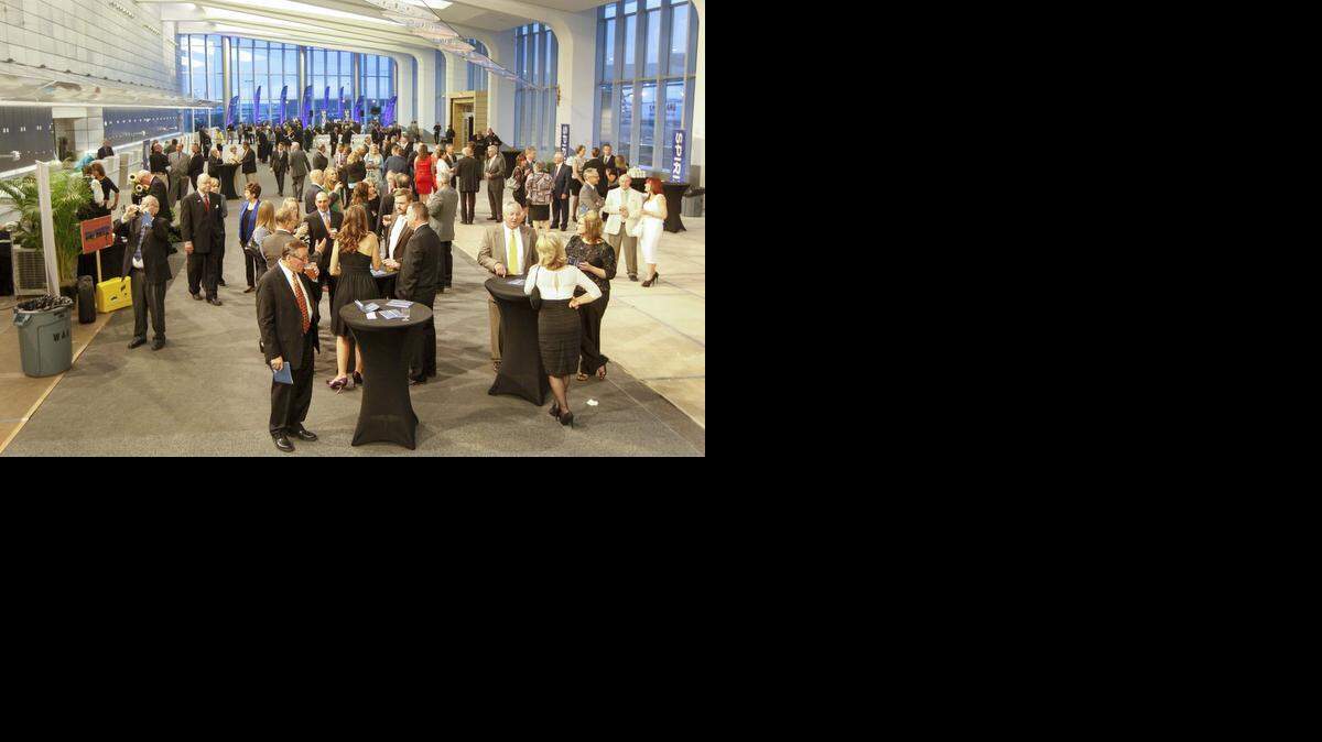 
People mingle Saturday night at the opening gala for the Wichita Dwight D. Eisenhower National Airport. (April 11, 2015)
