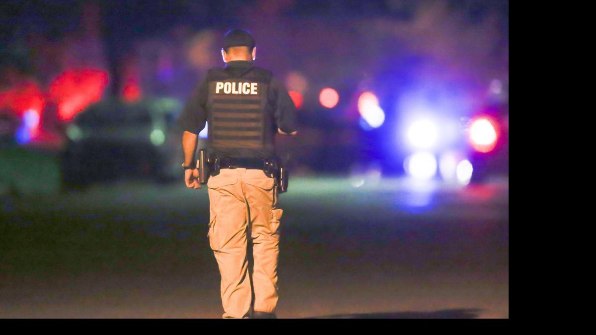 
Police investigate the scene of a homicide at 1600 block of North Lorraine Friday night. (July 24, 2015)
