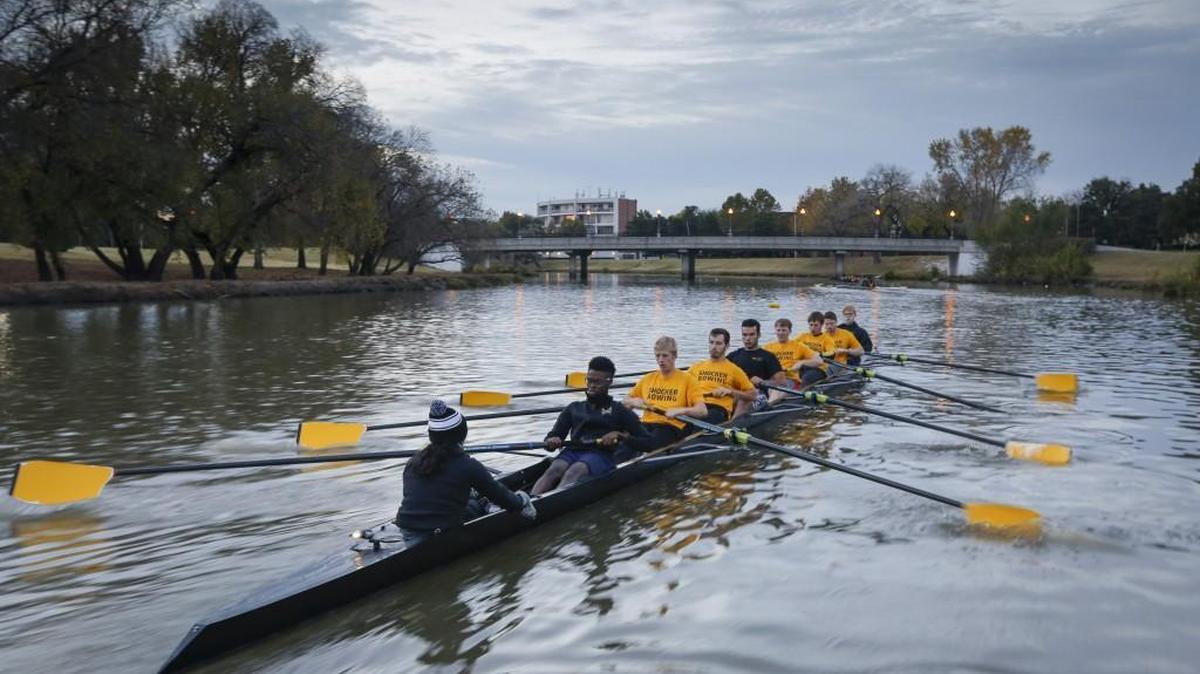 Members of the Wichita State men’s rowing team practice on the Little Arkansas River on Saturday, a day before they compete in the Wichita Frostbite Regatta.