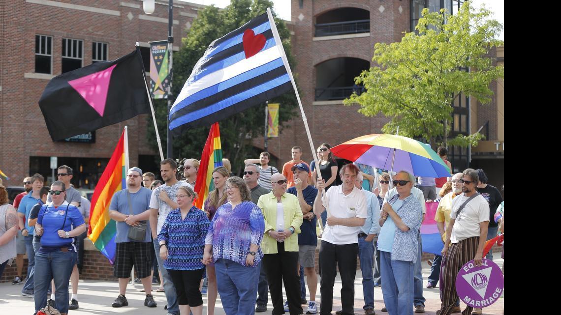 
A crowd gathers for a rally in Old Town Square in Wichita to support the Supreme Court's decision to recognize gay marriage across the United States. (June 26, 2015)
