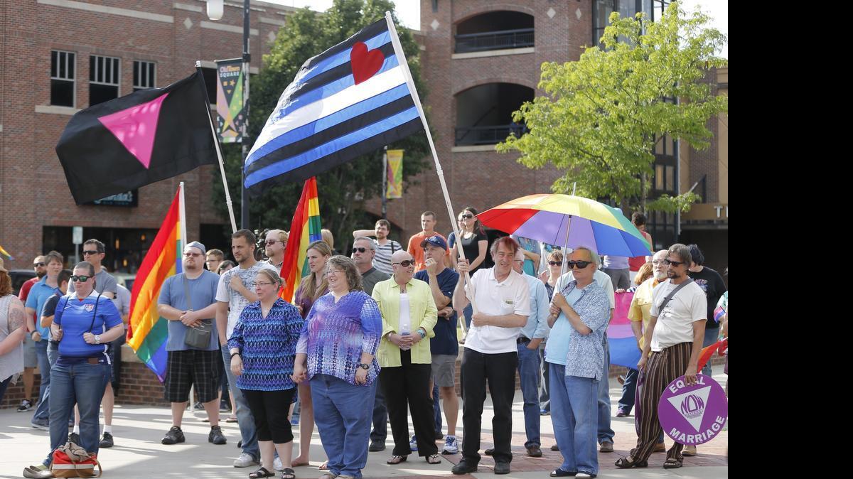 
A crowd gathers for a rally in Old Town Square in Wichita to support the Supreme Court's decision to recognize gay marriage across the United States. (June 26, 2015)

