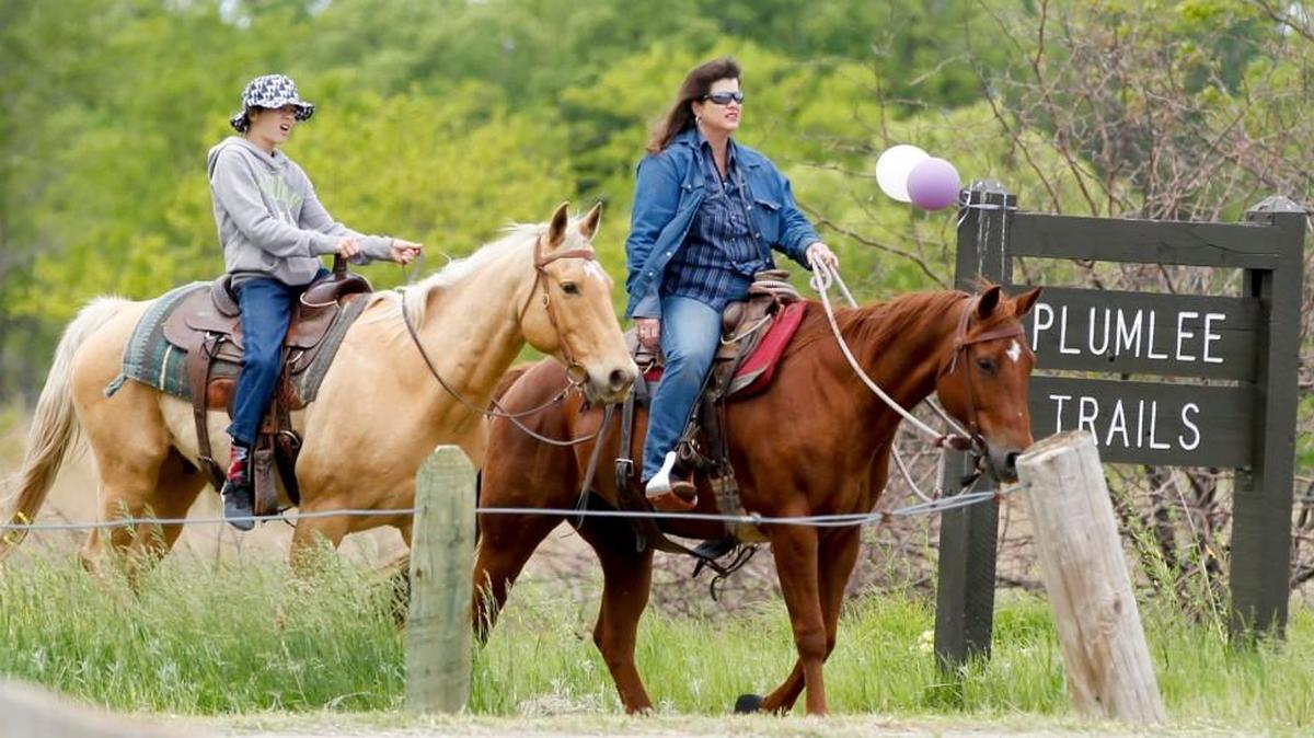 Horses and their riders at the Plumlee Trails in Pawnee Prairie Park on May 14. A free gelding clinic is scheduled to take place on Saturday in Wichita.