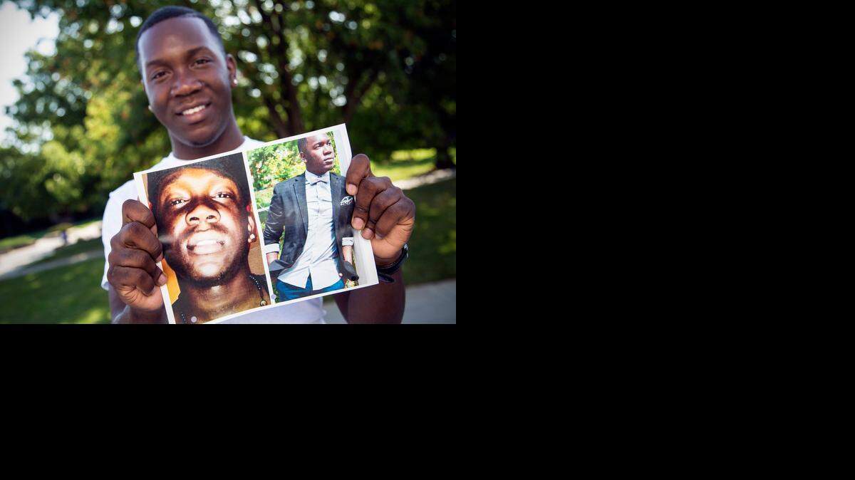 
Joseph Shepard, 21, who is majoring in criminal justice at Wichita State, holds a double portrait of himself. He is actively involved in diversity issues and says recent events in Ferguson, Mo., illustrate that communities here and elsewhere need to come together to overcome stereotypes. 
