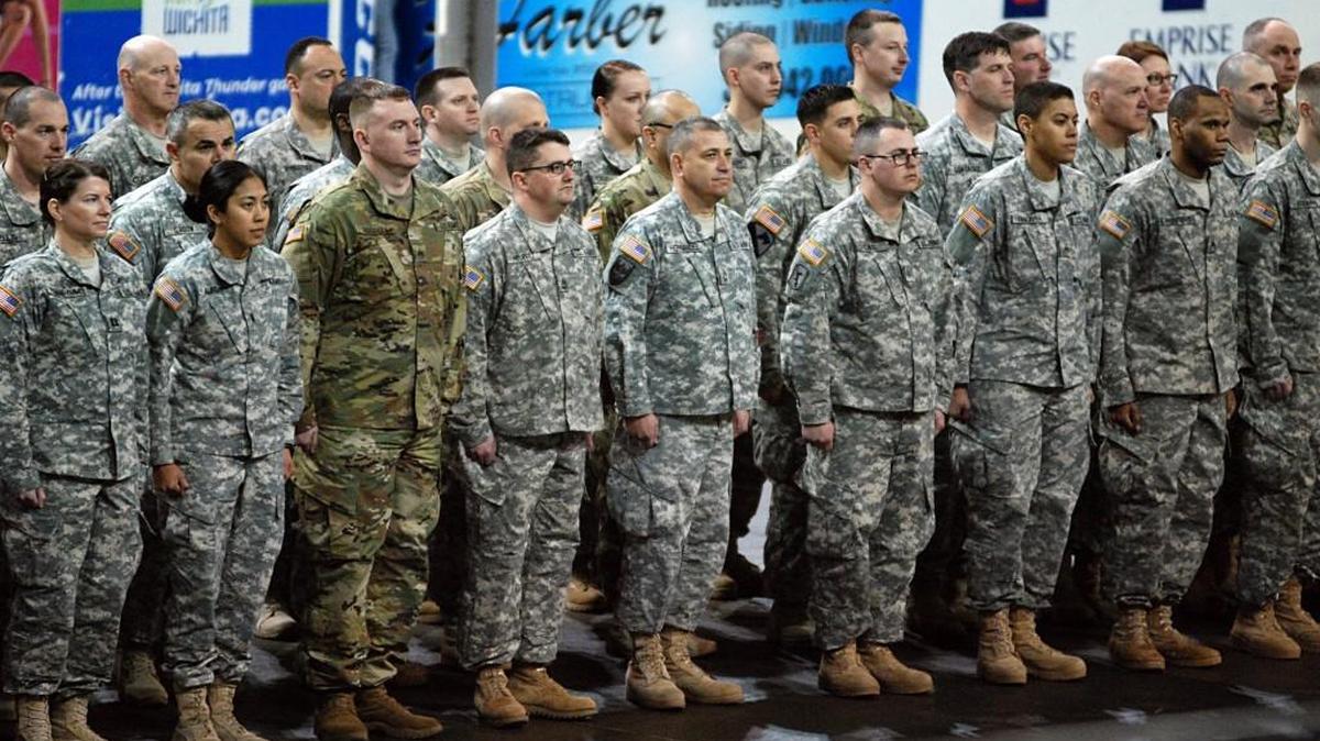 Troops from the 451st Expeditionary Sustainment Command line up at Intrust Bank Arena last month for a deployment ceremony. The Wichita-based Army Reserve Unit is completing training in Texas as it prepares to deploy to Kuwait.