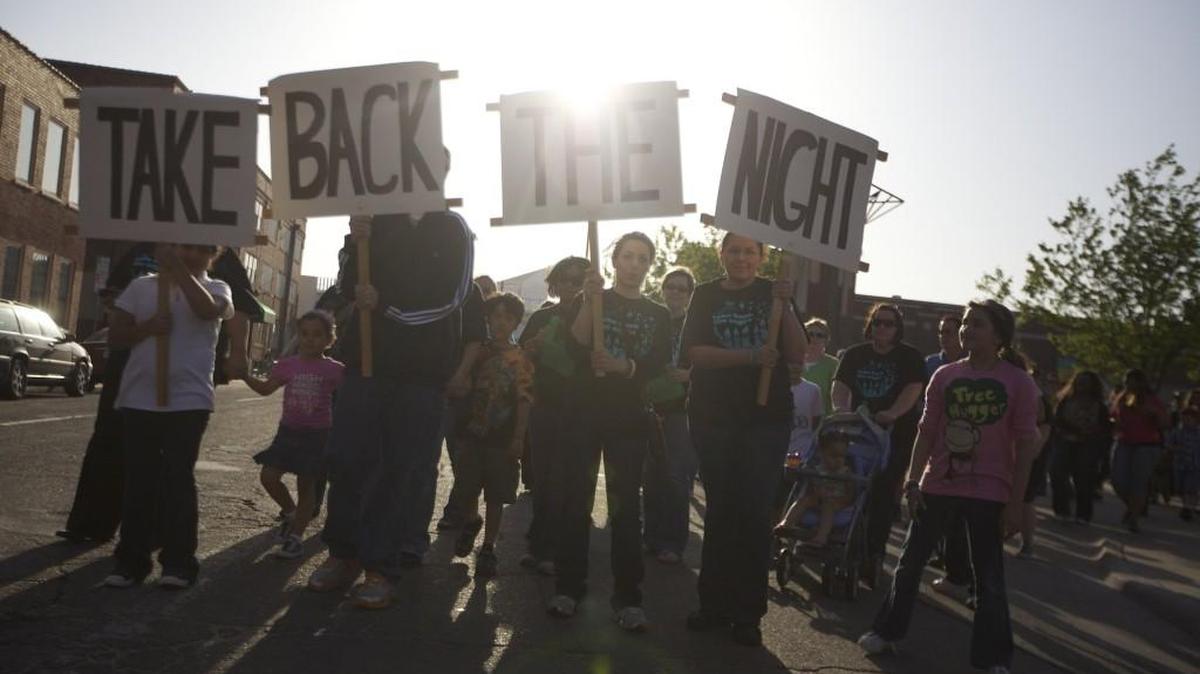 A previous Take Back the Night rally ends with a march through the streets of Old Town.