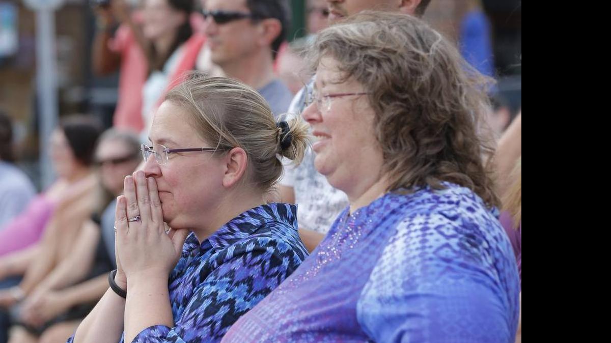 
Natalie, left, and Lisa Tos-Brightup attend a rally Friday in Wichita to celebrate the Supreme Court’s ruling on same-sex marriage. 
