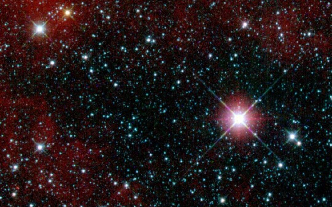 
This infrared snapshot of a region in the constellation Carina near the Milky Way was taken shortly after NASA’s Wide-field Infrared Survey Explorer ejected its cover. The “first-light” picture shows thousands of stars and covers an area three times the size of the moon. 
