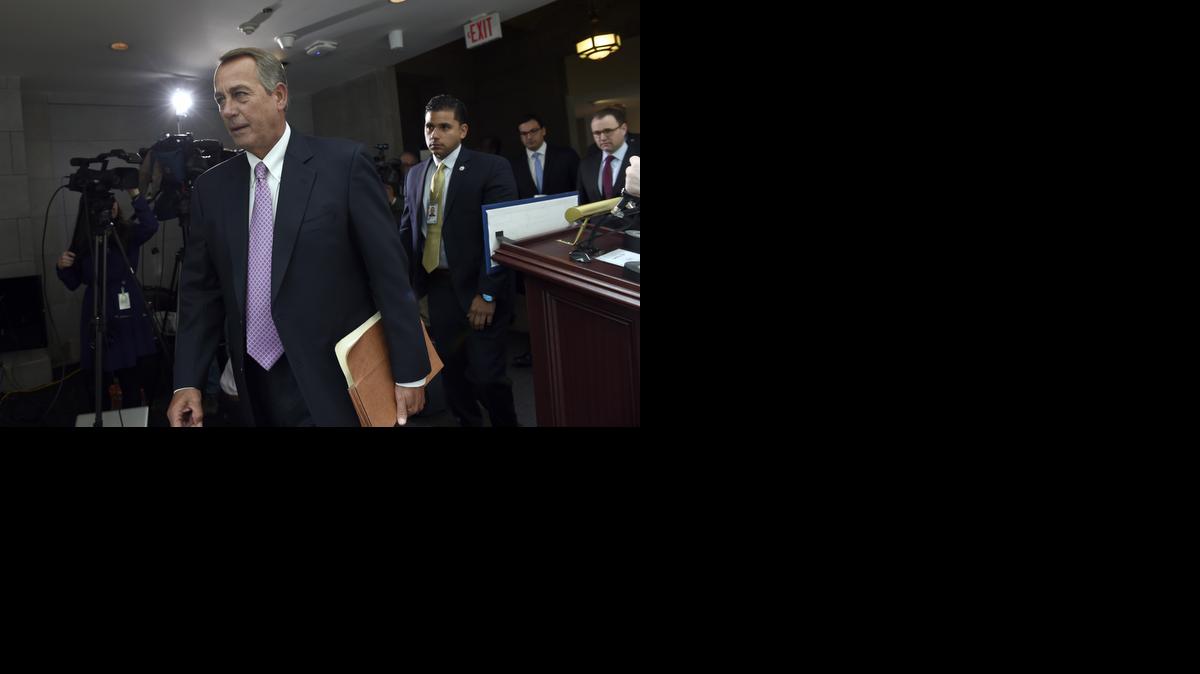 
House Speaker John Boehner of Ohio heads to a meeting on Capitol Hill in Washington, Wednesday. Pressure shifts to House Republicans after Senate GOP leaders agreed to Democratic demands and announced legislation to fund the Homeland Security Department.
