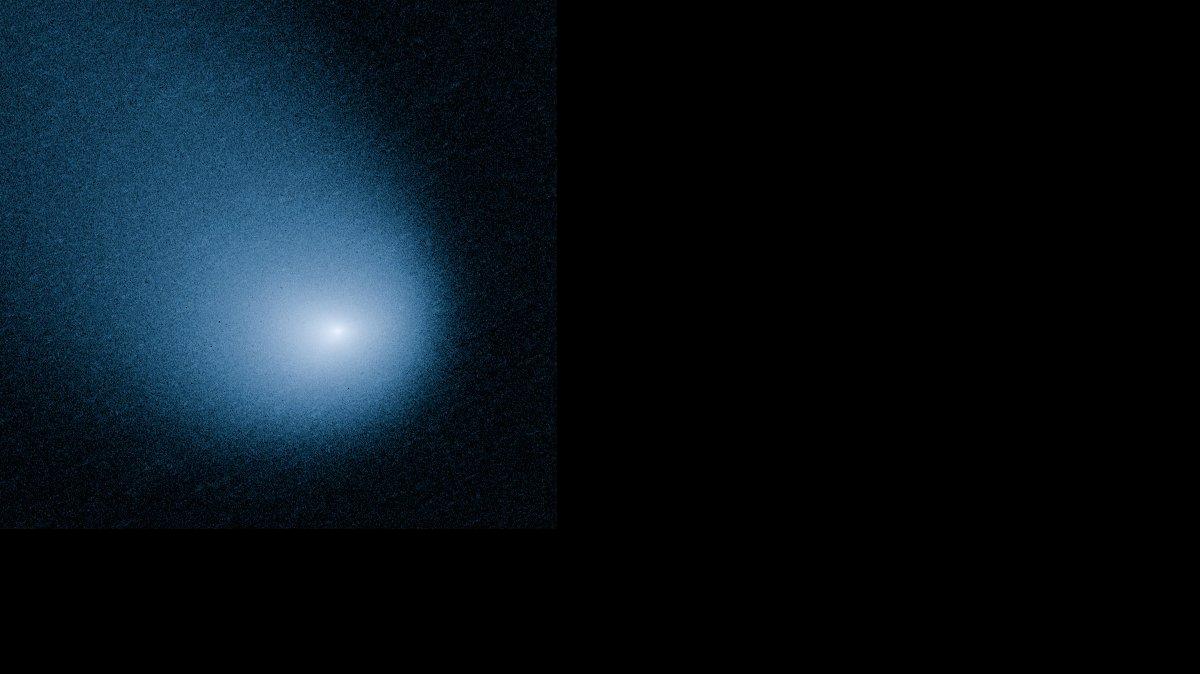 
Comet C/2013 A1, also known as Siding Spring, was captured by Wide Field Camera 3 on NASA's Hubble Space Telescope in March. It will skim past Mars on Sunday at 126,000 mph.

