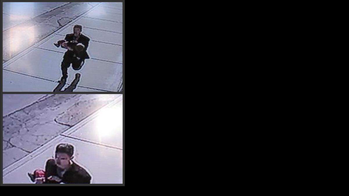 
In this combination of still images taken from surveillance video on Sunday, March 8, 2015, and provided by the Lincoln County Sheriff's Office, a man runs down a street, carrying a toddler in an apparent kidnapping attempt in Sprague, Wash. The video shows the boy's young sister chasing after the man, who set the boy down and ran off. Lincoln County Sheriff Wade Magers says officers don't have any leads in the search for the suspect, but they don't believe the man is a resident of the town of about 500 people. The boy, 22-month-old Owen Wright, was unhurt. (AP Photo/Lincoln County Sheriff's Office) 
