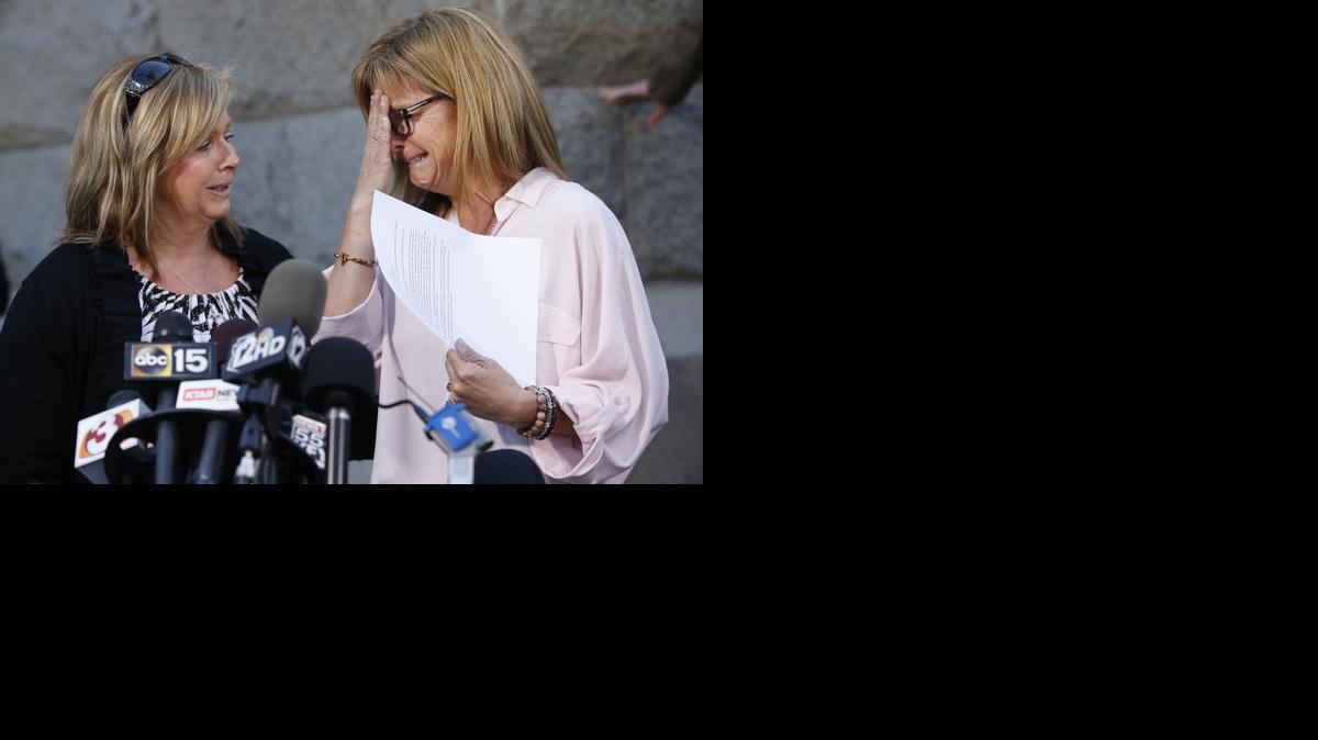 
Terri Crippes, left, and Lori Lyon, aunts of Kayla Mueller, speak at a press conference in Prescott, Ariz., Tuesday.
