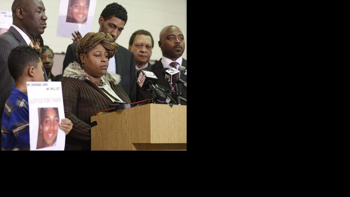 
Samaria Rice, the mother of Tamir, a 12-year-old boy fatally shot by a Cleveland police officer, speaks during a news conference Monday in Cleveland. Surveillance video released by police shows Tamir Rice being shot within 2 seconds of a patrol car stopping within a few feet of him at a park on Nov. 22. (Dec. 8, 2014)
