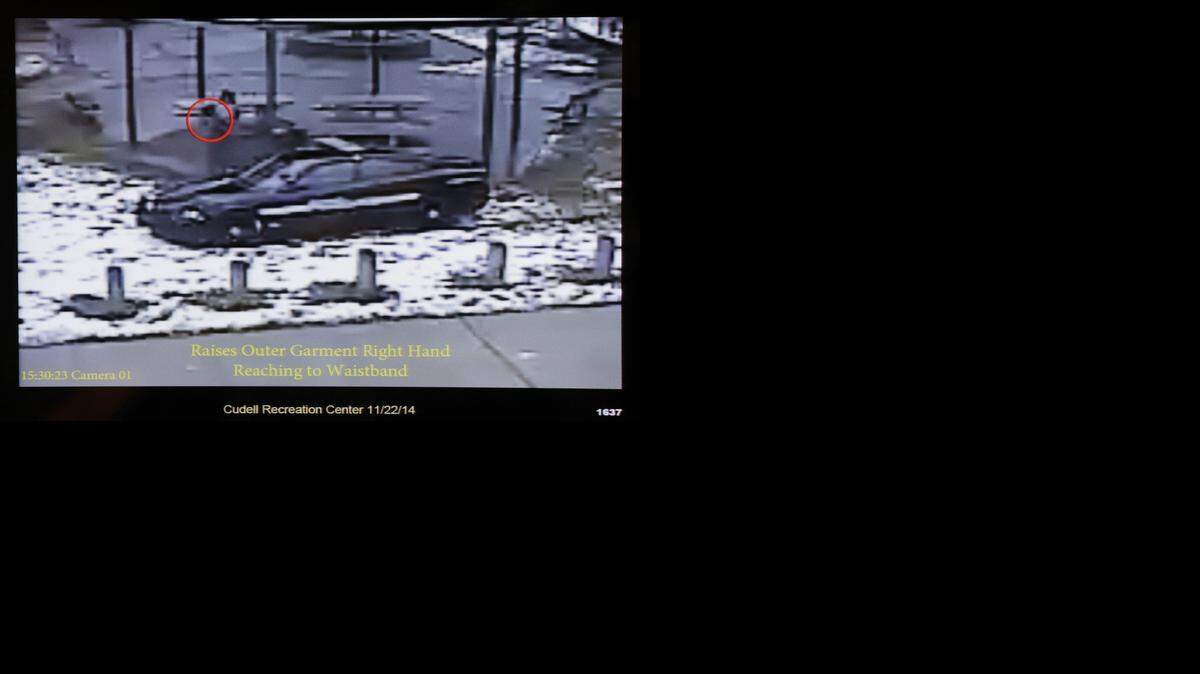 
This still image taken from a surveillance video played at a news conference held by Cleveland police on Nov. 26 shows Cleveland police officers arriving at Cudell Park on a report of a man with a gun. Twelve-year-old Tamir Rice was fatally shot by a Cleveland police officer Nov. 22, after he reportedly pulled a replica gun at the city park. 
