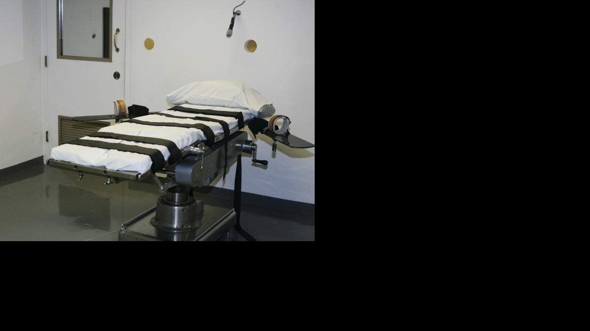 
The gurney in the execution chamber at the Oklahoma State Penitentiary is pictured in McAlester, Okla. A report on a problematic execution in Oklahoma shows lethal drugs caused the inmate to die, not a heart attack, after the state’s prisons chief halted efforts to kill him. (2008)

