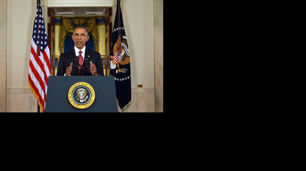 
President Barack Obama addresses the nation from the Cross Hall in the White House in Washington, Wednesday, Sept. 10, 2014. In a major reversal, Obama ordered the United States into a broad military campaign to “degrade and ultimately destroy” militants in two volatile Middle East nations, authorizing airstrikes inside Syria for the first time, as well as an expansion of strikes in Iraq.
