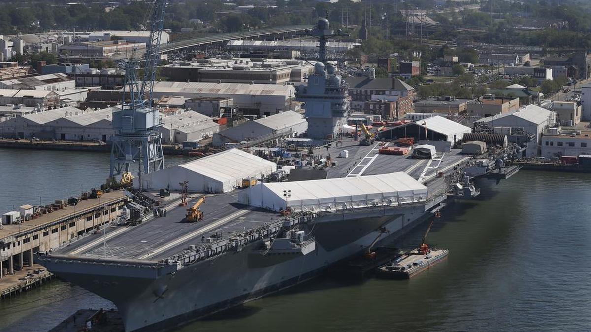 In this April photo, the USS Gerald R. Ford is stationed at Newport News Shipbuilding in Newport News, Va. The $12.9 billion warship, the first of the Navy’s next generation of aircraft carriers, is in the final stages of construction after cost overruns and a delay of more than one year.