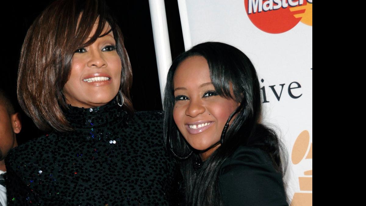
Singer Whitney Houston, left, and daughter Bobbi Kristina Brown arrive at an event in Beverly Hills, Calif. Brown, who was in hospice after months of receiving medical care, died Sunday. (Feb. 12, 2011)
