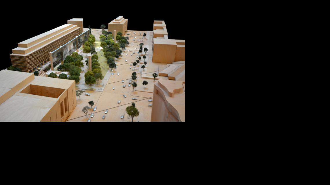 
This undated handout image provided by Gehry Partners, LLP shows an aerial perspective of Eisenhower Square looking along Maryland Avenue, SW and Independence Avenue in Washington. Members of a federal commission planning a memorial near the National Mall to honor the late President Dwight D. Eisenhower are voting on how to proceed after years of controversy. The Eisenhower Memorial Commission met last week but didn’t have enough members present. So they are holding an electronic vote by the end of the day Wednesday on how to proceed. Architect Frank Gehry has presented a revised design for a proposed memorial park after objections from critics and Eisenhower’s family. The revised design eliminates two large, metal tapestries on the sides of the park. One long tapestry would remain as a backdrop, depicting the Kansas landscape of Ike’s boyhood home. 
