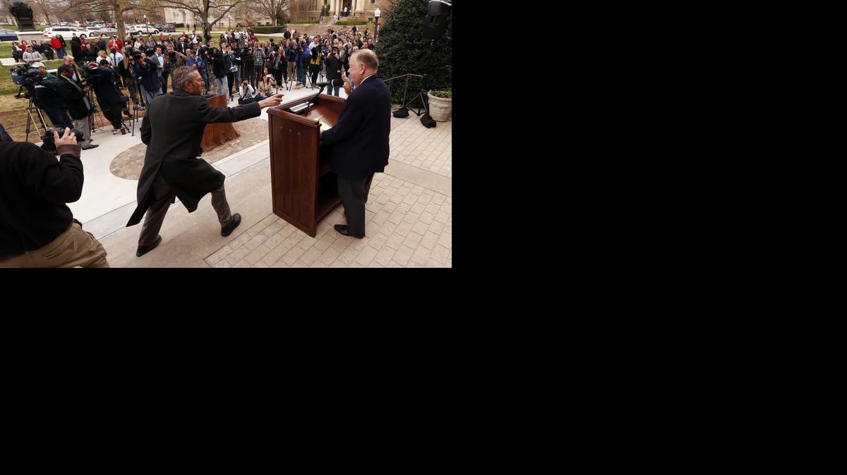 
Oklahoma University President David L. Boren, right, announces the final results regarding the investigation into the SAE bus incident on Friday, in Norman, Okla.
