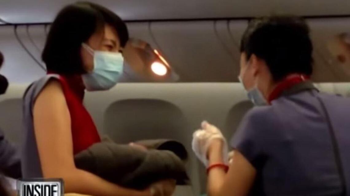 Woman delivers baby during international flight (+video)