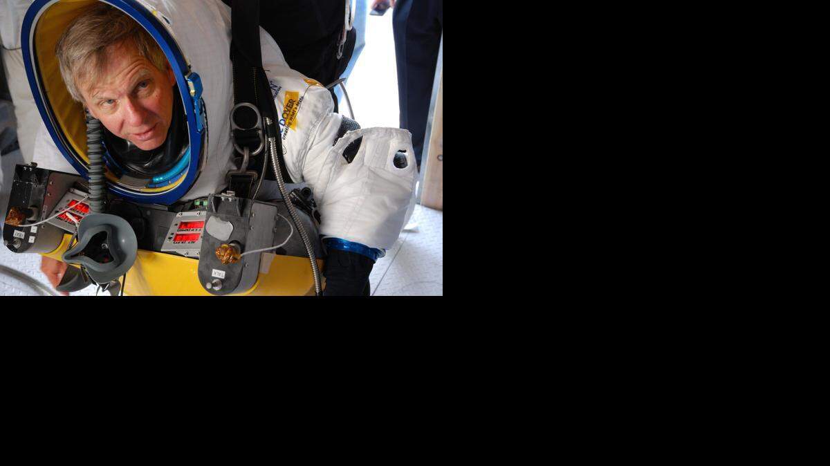 
In this Oct. 20, 2014 photo provided by Paragon Space Development Corporation, Google executive Alan Eustace is shown before a test flight for his Friday, Oct. 24, 2014 leap from the edge of space that broke the sound barrier and set several skydiving records over the southern New Mexico desert outside Roswell. Eustace's supersonic jump was part of a project by Paragon Space Development Corp. and its Stratospheric Explorer team, which has been working secretly for years to develop a self-contained commercial spacesuit that would allow people to explore some 20 miles above the Earth's surface. (AP Photo/Paragon Space Development Corporation) 
